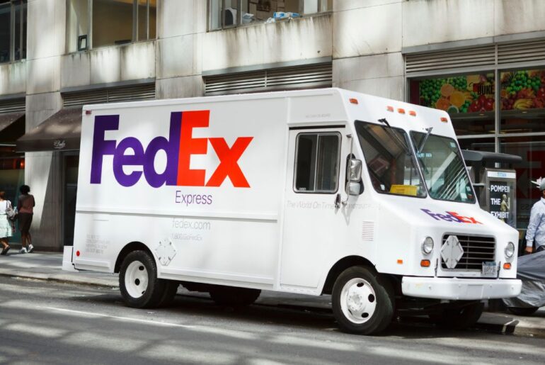 A FedEx express truck parked on the road