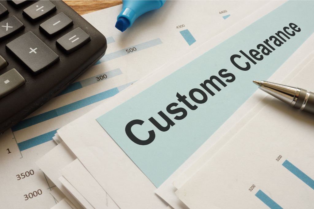Customs Clearance is printed on the paper