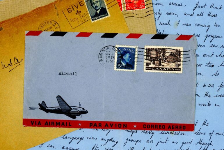 an envelope with postage stamps