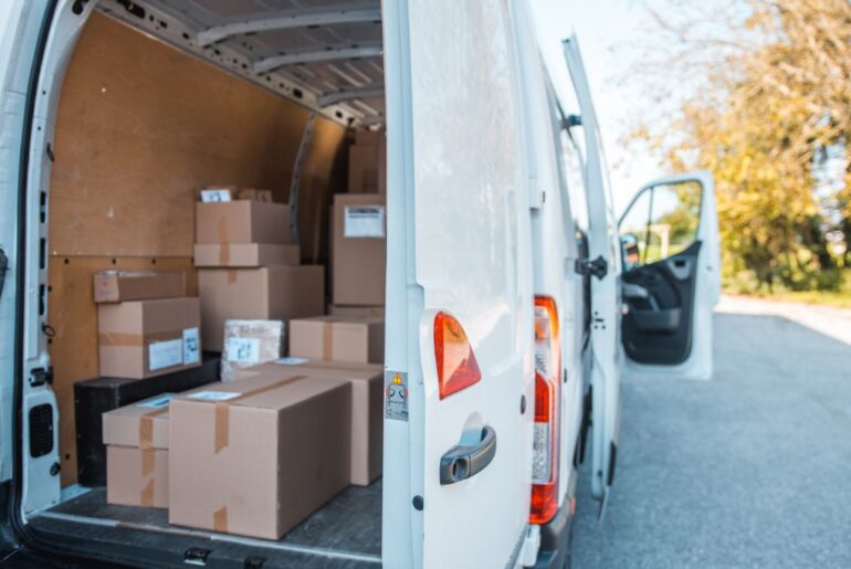 white van with packages to be delivered