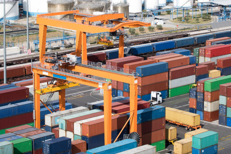 several cargo containers on a dock