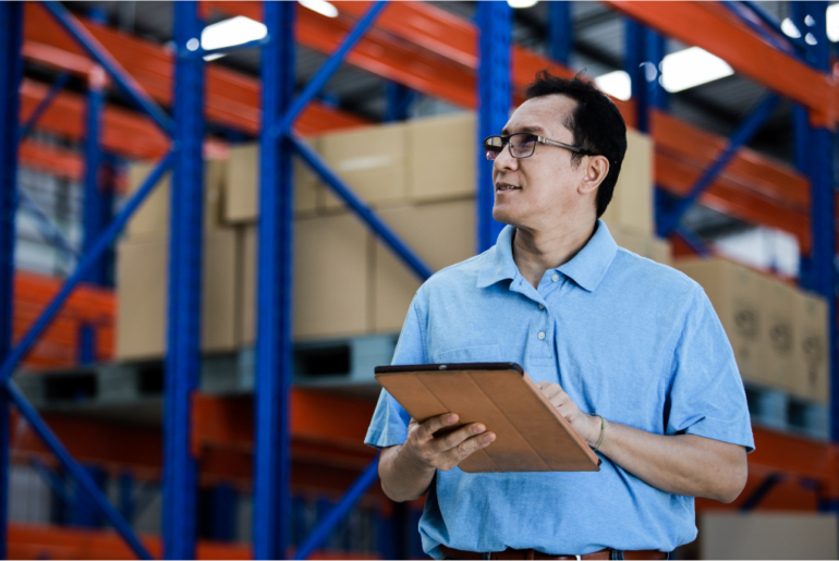 staff checking cargo for shipment